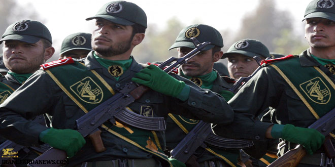 In this Sept. 21, 2008 file photo, Iranian Revolutionary Guard members march during a parade ceremony, marking the 28th anniversary of the onset of the Iran-Iraq war (1980-1988), just outside Tehran, Iran. Iran’s paramilitary Revolution Guard faces a new enemy in the Islamic Republic’s opening economy. That can be seen in a Guard general criticizing a $650-million deal struck with South Korea’s Hyundai Heavy Industries, Friday, Dec. 9, 2016. Analysts say the Guard wants to maintain its hold in Iran’s economy, as well as slow any demand for change in the clerically overseen government it’s sworn to protect.